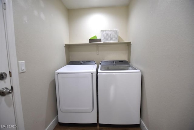 6628 Ives Ave, Las Vegas, NV 89108 - laundry room featuring independent washer and dryer and dark wood-style floors