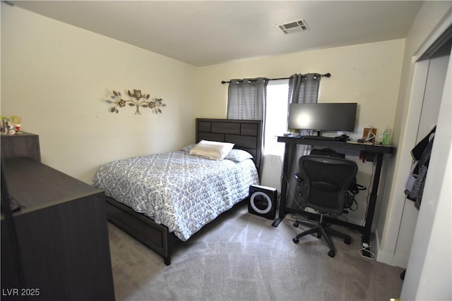 6628 Ives Ave, Las Vegas, NV 89108 - carpeted bedroom featuring an office area