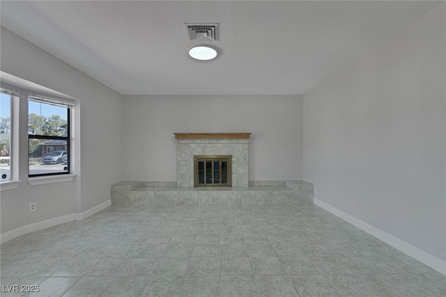 1841 Feather Way, Las Vegas, NV 89108 - unfurnished living room featuring tile patterned floors and a fireplace