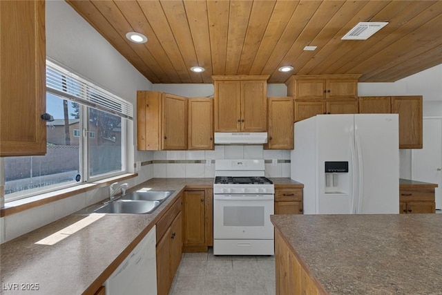 1841 Feather Way, Las Vegas, NV 89108 - kitchen with white appliances, under cabinet range hood, wood ceiling, recessed lighting, and dark countertops