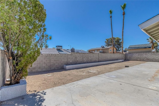 1841 Feather Way, Las Vegas, NV 89108 - fenced backyard with a patio area