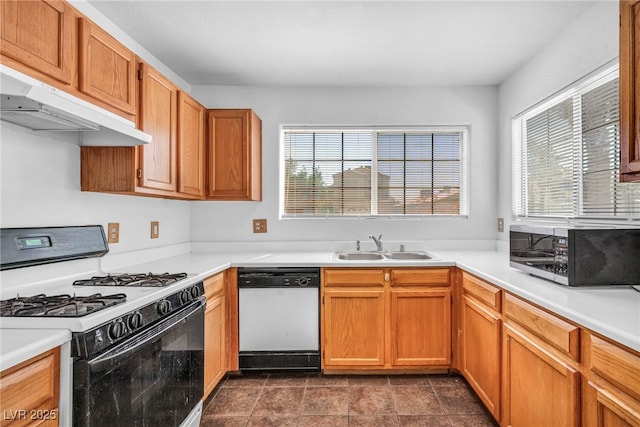2165 Saint Paul Way, Las Vegas, NV 89104 - kitchen featuring dishwasher, gas range gas stove, under cabinet range hood, and plenty of natural light