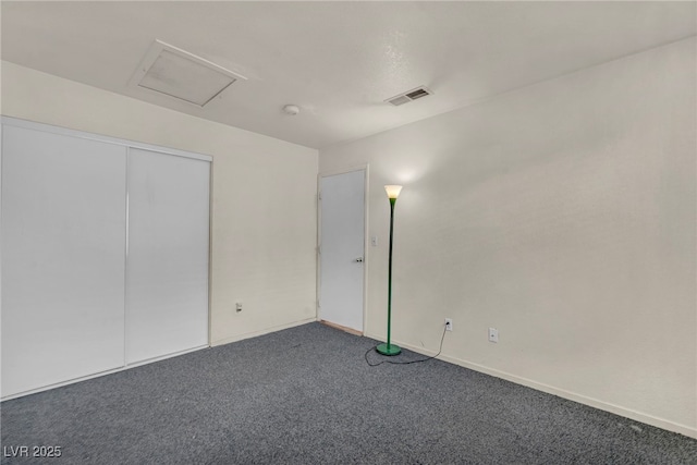 2165 Saint Paul Way, Las Vegas, NV 89104 - unfurnished bedroom featuring carpet flooring, attic access, and a closet