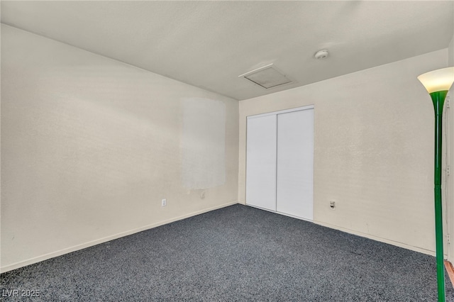 2165 Saint Paul Way, Las Vegas, NV 89104 - unfurnished bedroom with dark colored carpet and attic access