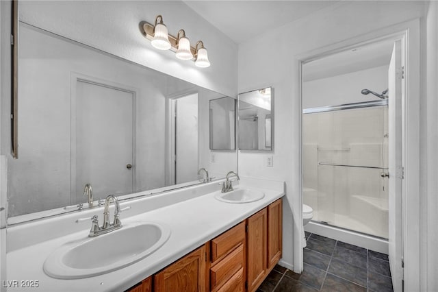2165 Saint Paul Way, Las Vegas, NV 89104 - bathroom featuring double vanity and a shower stall
