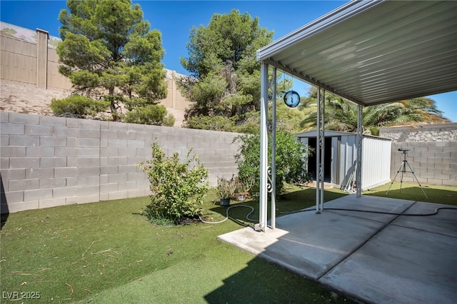 2165 Saint Paul Way, Las Vegas, NV 89104 - fenced backyard with a shed and a patio area