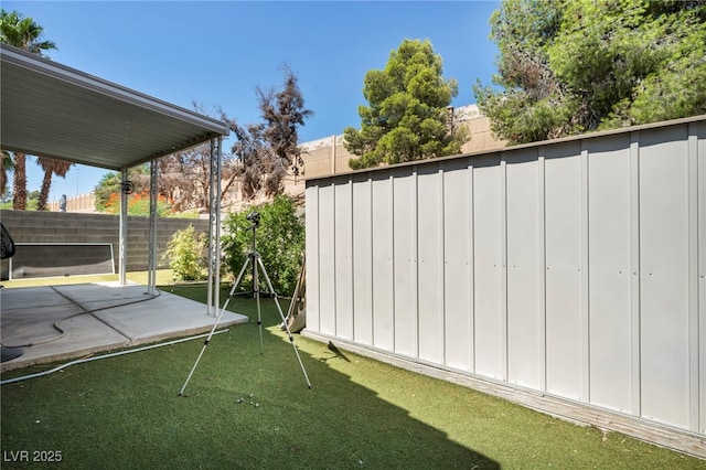 2165 Saint Paul Way, Las Vegas, NV 89104 - fenced backyard with a patio