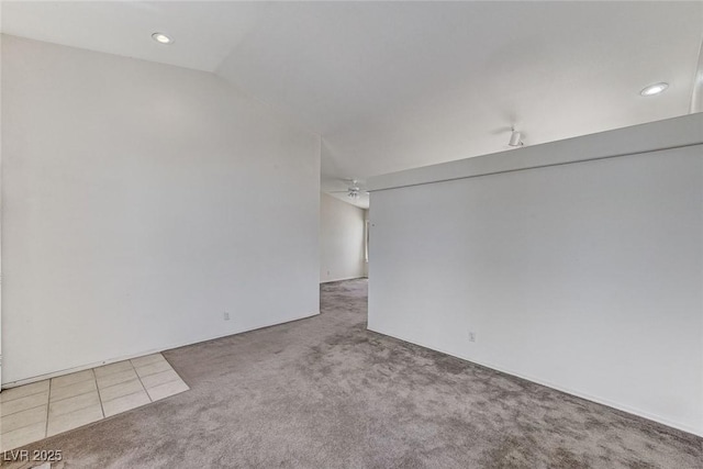 5917 Briar Rose Ln, Las Vegas, NV 89130 - carpeted empty room featuring ceiling fan, recessed lighting, vaulted ceiling, and tile patterned floors