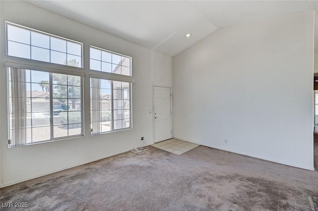 5917 Briar Rose Ln, Las Vegas, NV 89130 - carpeted empty room featuring high vaulted ceiling and recessed lighting