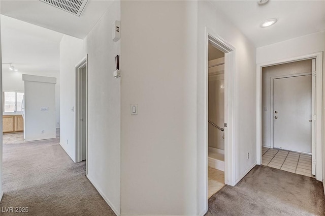 5917 Briar Rose Ln, Las Vegas, NV 89130 - corridor featuring light colored carpet and baseboards