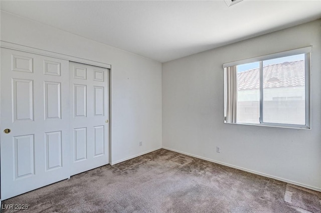 5917 Briar Rose Ln, Las Vegas, NV 89130 - unfurnished bedroom with carpet and a closet