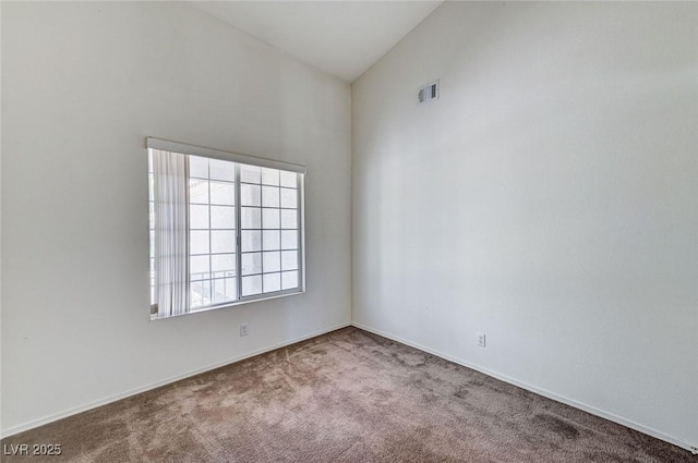 5917 Briar Rose Ln, Las Vegas, NV 89130 - carpeted spare room with healthy amount of natural light and high vaulted ceiling