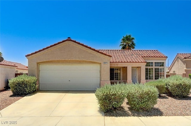 5917 Briar Rose Ln, Las Vegas, NV 89130 - mediterranean / spanish-style house with stucco siding, a garage, driveway, and a tile roof