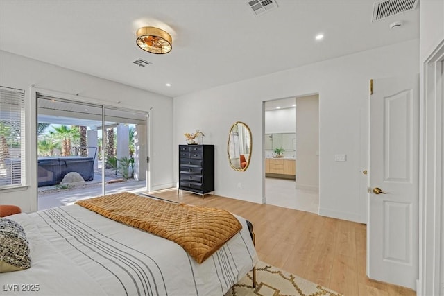 328 Hedgehope Dr, Las Vegas, NV 89183 - bedroom with access to outside, light wood finished floors, recessed lighting, and ensuite bath