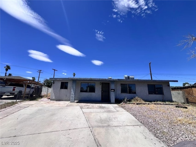 6120 Denver Cir, Las Vegas, NV 89107 - ranch-style home featuring stucco siding, concrete driveway, and a patio area