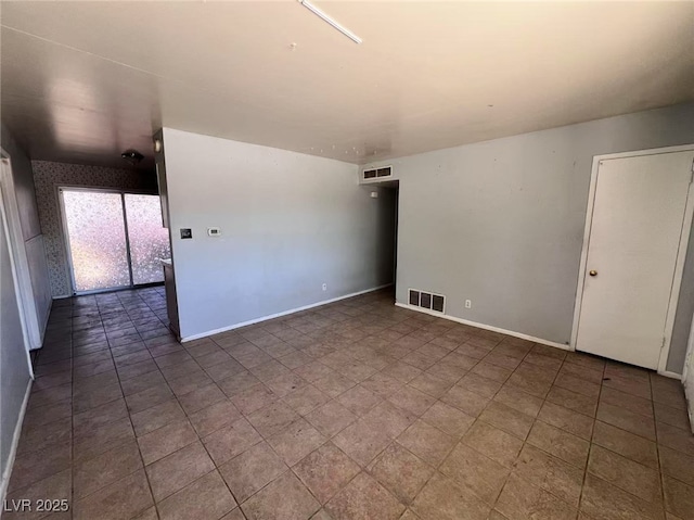 6120 Denver Cir, Las Vegas, NV 89107 - empty room featuring baseboards