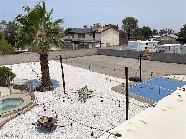 6140 Atwood Ave, Las Vegas, NV 89108 - view of yard featuring an in-ground hot tub