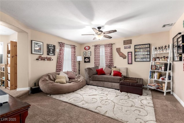 9380 Arrowhead Bluff Ave, Las Vegas, NV 89149 - living area with carpet and a ceiling fan