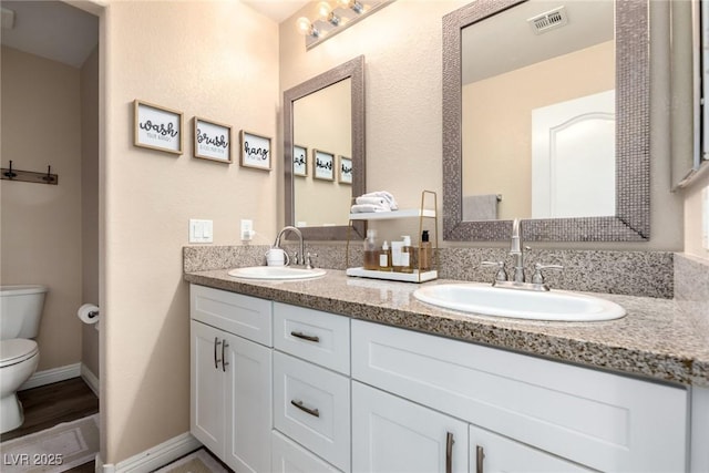 9380 Arrowhead Bluff Ave, Las Vegas, NV 89149 - full bath featuring toilet and double vanity