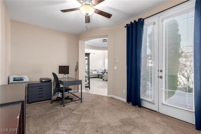 9380 Arrowhead Bluff Ave, Las Vegas, NV 89149 - office with arched walkways, a ceiling fan, carpet floors, and healthy amount of natural light