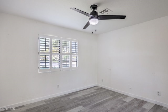 5320 Castle Harbor Ave, Las Vegas, NV 89130 - empty room with ceiling fan and wood finished floors