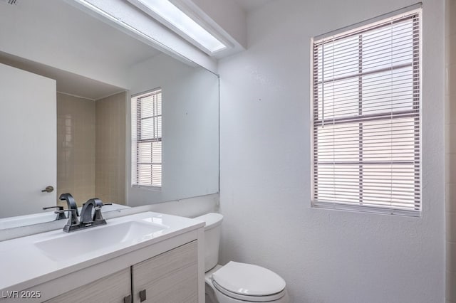 5320 Castle Harbor Ave, Las Vegas, NV 89130 - bathroom with toilet and vanity