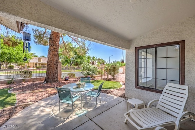 5320 Castle Harbor Ave, Las Vegas, NV 89130 - view of patio / terrace with outdoor dining area