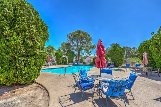 5320 Castle Harbor Ave, Las Vegas, NV 89130 - community pool featuring a patio area