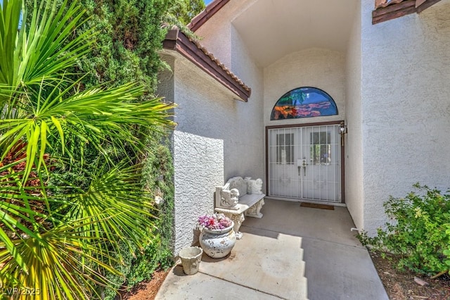 5320 Castle Harbor Ave, Las Vegas, NV 89130 - doorway to property with stucco siding