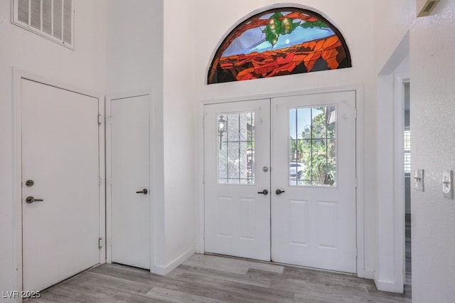 5320 Castle Harbor Ave, Las Vegas, NV 89130 - foyer featuring light wood-style floors and baseboards