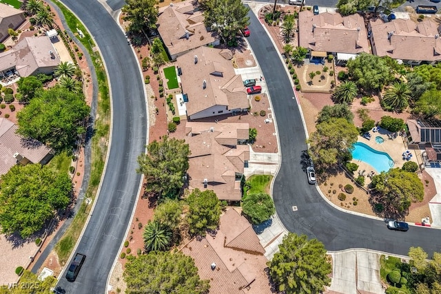 5320 Castle Harbor Ave, Las Vegas, NV 89130 - aerial view of property's location with a pool area and nearby suburban area