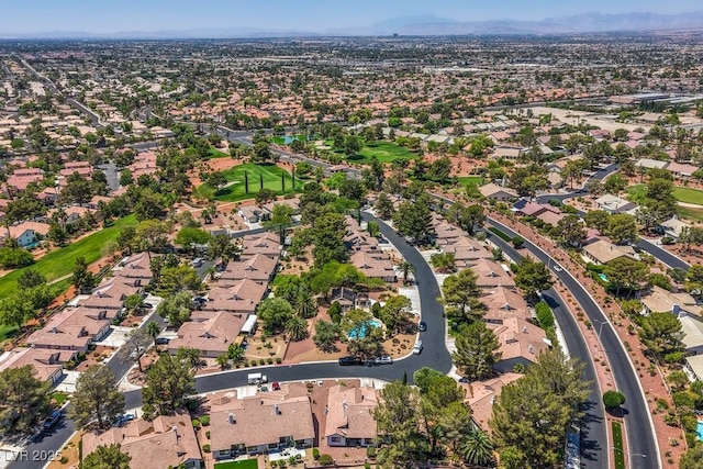 5320 Castle Harbor Ave, Las Vegas, NV 89130 - aerial view of property and surrounding area with nearby suburban area and a mountainous background