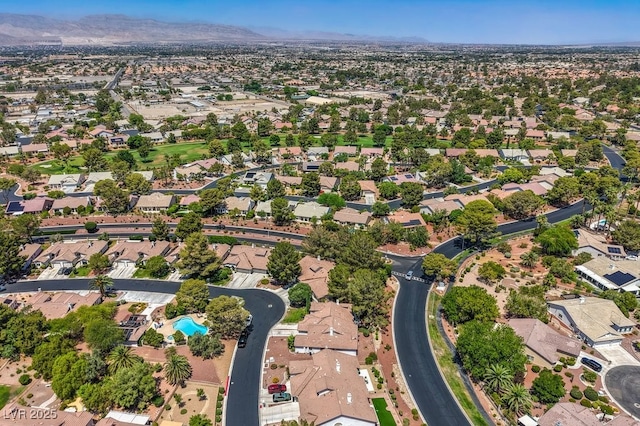 5320 Castle Harbor Ave, Las Vegas, NV 89130 - aerial overview of property's location featuring mountains and nearby suburban area