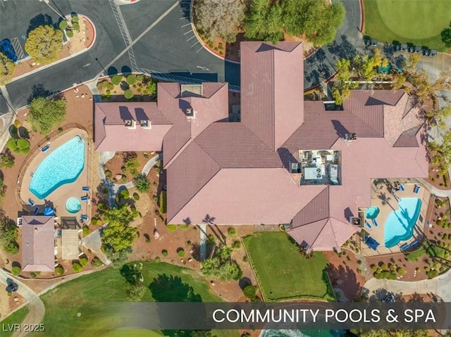 5320 Castle Harbor Ave, Las Vegas, NV 89130 - aerial view of property and surrounding area with a pool
