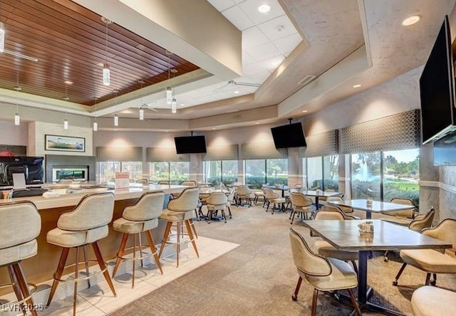 5320 Castle Harbor Ave, Las Vegas, NV 89130 - carpeted dining space with a tray ceiling