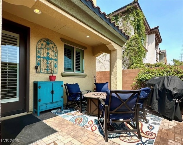 2132 Solvang Mill Dr, Las Vegas, NV 89135 - view of patio featuring an outdoor fire pit and a grill