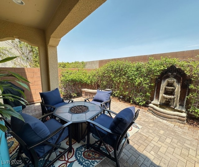 2132 Solvang Mill Dr, Las Vegas, NV 89135 - view of patio with a fire pit and a grill
