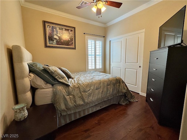 2132 Solvang Mill Dr, Las Vegas, NV 89135 - bedroom featuring dark wood-style floors, crown molding, a closet, and a ceiling fan