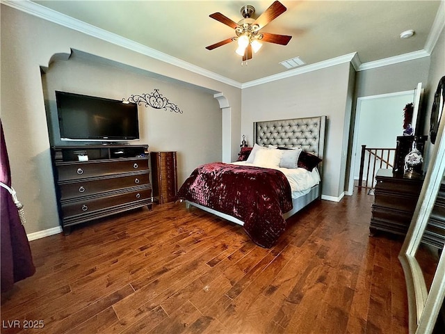 2132 Solvang Mill Dr, Las Vegas, NV 89135 - bedroom with wood finished floors, ornamental molding, and a ceiling fan