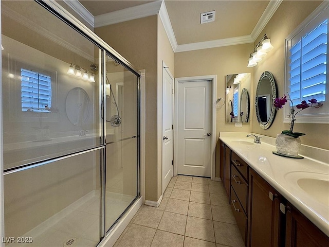 2132 Solvang Mill Dr, Las Vegas, NV 89135 - bathroom with double vanity, ornamental molding, a stall shower, and tile patterned flooring
