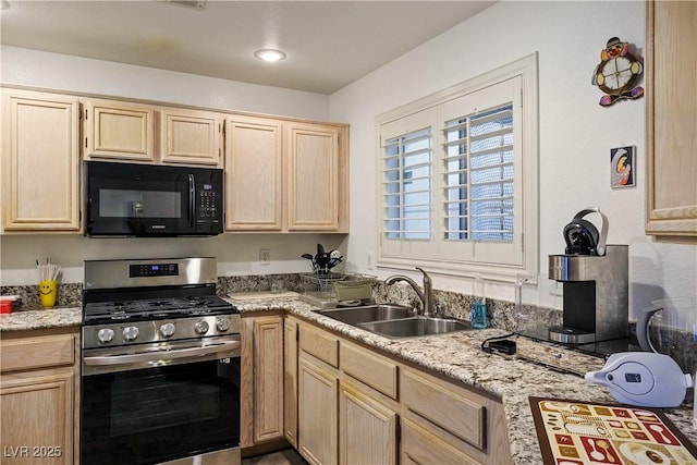 1809 Cutlass Dr Unit 0, Henderson, NV 89014 - kitchen featuring stainless steel range with gas stovetop, black microwave, and light brown cabinetry