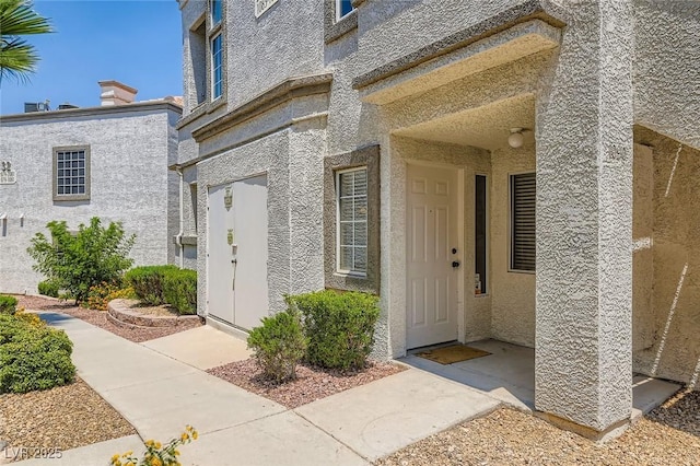 3125 N Buffalo Dr Unit 1090, Las Vegas, NV 89128 - doorway to property featuring stucco siding