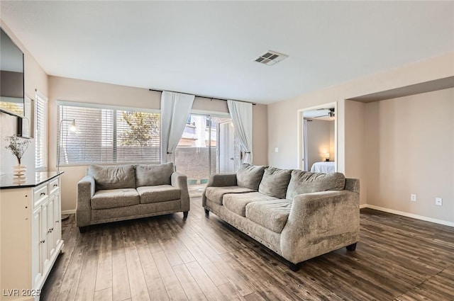 3125 N Buffalo Dr Unit 1090, Las Vegas, NV 89128 - living room featuring dark wood-type flooring and ceiling fan