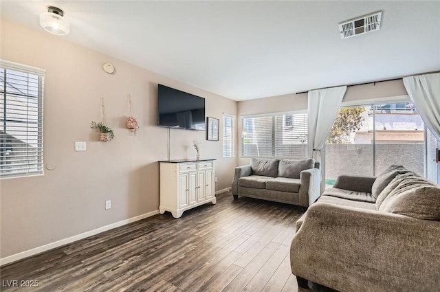 3125 N Buffalo Dr Unit 1090, Las Vegas, NV 89128 - living room featuring dark wood-type flooring and baseboards