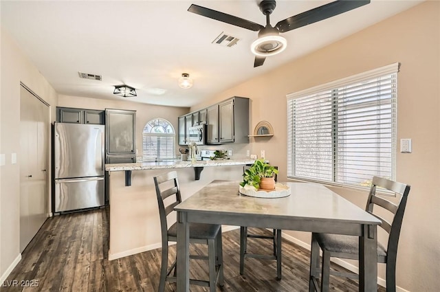 3125 N Buffalo Dr Unit 1090, Las Vegas, NV 89128 - dining room featuring dark wood-style flooring and a ceiling fan