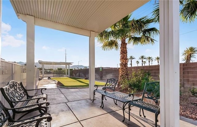 3125 N Buffalo Dr Unit 1090, Las Vegas, NV 89128 - fenced backyard featuring a patio