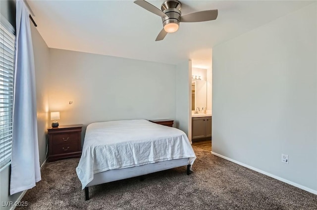 3125 N Buffalo Dr Unit 1090, Las Vegas, NV 89128 - carpeted bedroom with ensuite bathroom and a ceiling fan