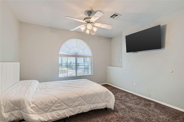 3125 N Buffalo Dr Unit 1090, Las Vegas, NV 89128 - carpeted bedroom with ceiling fan and baseboards