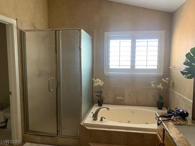 302 Doe Run, Henderson, NV 89012 - full bath with a jetted tub, a shower stall, and vanity