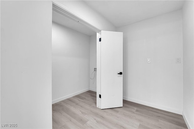 1317 Pyramid Dr, Las Vegas, NV 89108 - spare room with wood finished floors and baseboards